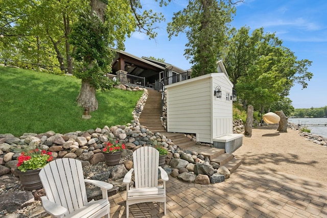 11847 Gulden Ave NW, Maple Lake, MN 55358 - view of patio / terrace featuring stairway and a water view