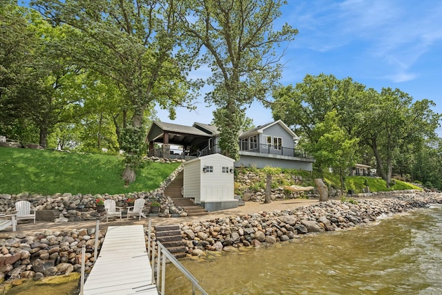 11847 Gulden Ave NW, Maple Lake, MN 55358 - dock area featuring stairway, a water view, and a lawn