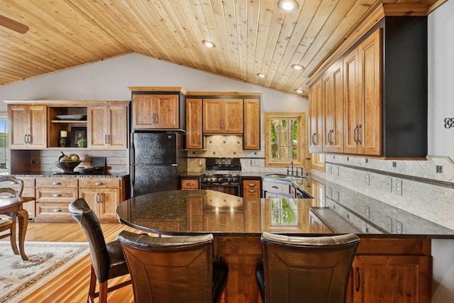 11847 Gulden Ave NW, Maple Lake, MN 55358 - kitchen featuring black appliances, vaulted ceiling, wooden ceiling, open shelves, and recessed lighting