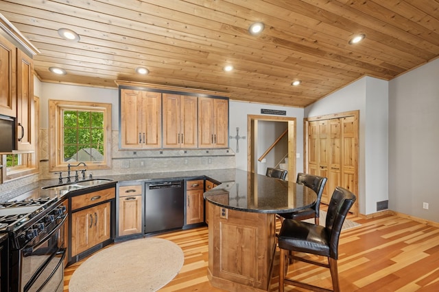 11847 Gulden Ave NW, Maple Lake, MN 55358 - kitchen featuring dishwasher, gas stove, tasteful backsplash, a breakfast bar area, and recessed lighting
