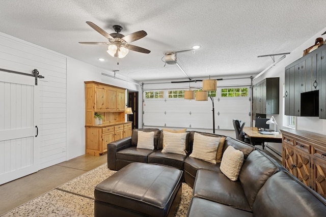 11847 Gulden Ave NW, Maple Lake, MN 55358 - living room with a ceiling fan, finished concrete floors, a textured ceiling, and recessed lighting
