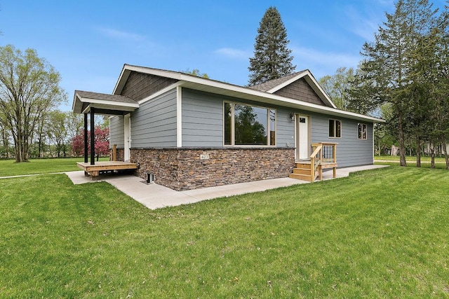 423 State St E, Grey Eagle, MN 56336 - ranch-style home featuring stone siding and a front yard