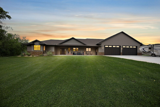 1116 County Road 46, Clearwater, MN 55320 - view of front of home with an attached garage, a lawn, driveway, and covered porch