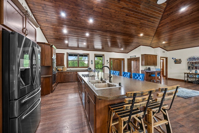1116 County Road 46, Clearwater, MN 55320 - kitchen with stainless steel appliances, wood ceiling, a sink, a large island, and dark countertops