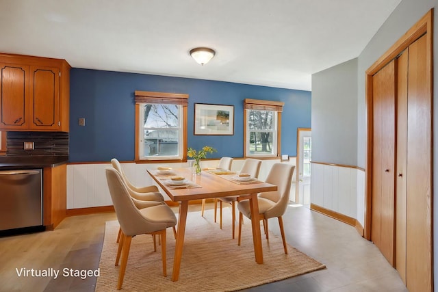 dining room with wainscoting