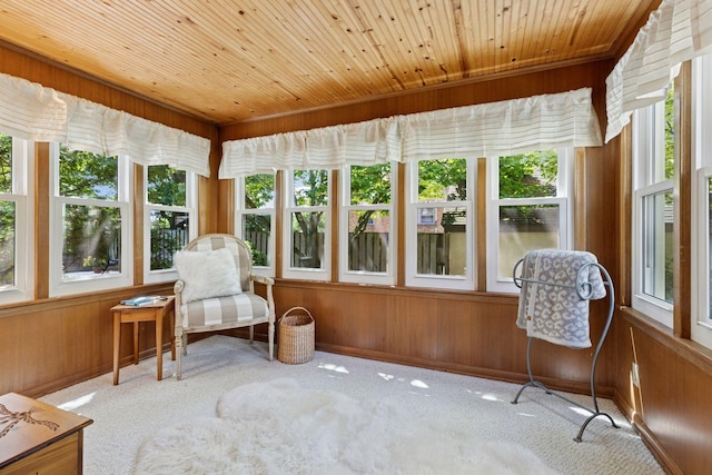 1804 Pinehurst Ave, Saint Paul, MN 55116 - sunroom / solarium featuring healthy amount of natural light, wood walls, wood ceiling, and carpet