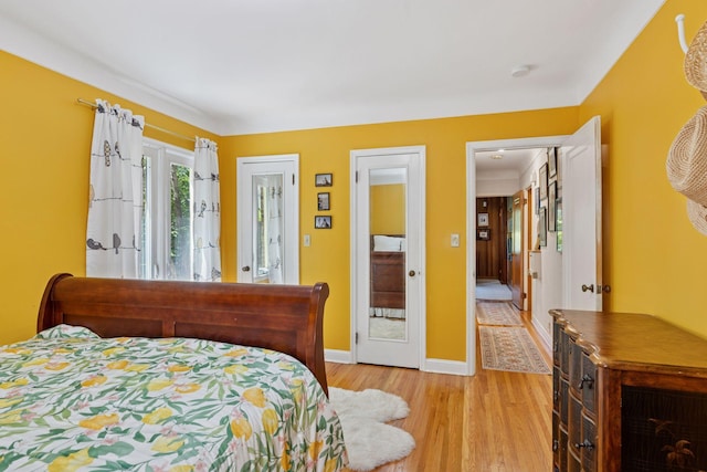 1804 Pinehurst Ave, Saint Paul, MN 55116 - bedroom featuring light wood-type flooring and baseboards
