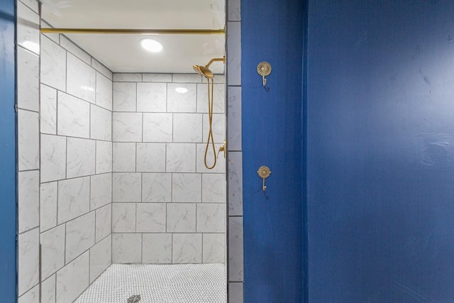 bathroom with a tile shower