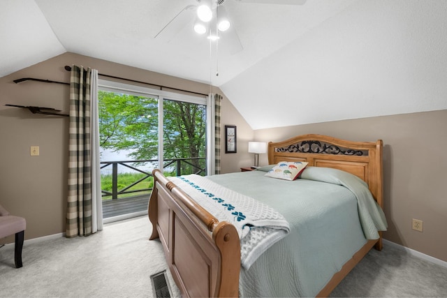 bedroom with vaulted ceiling, baseboards, access to outside, and light colored carpet