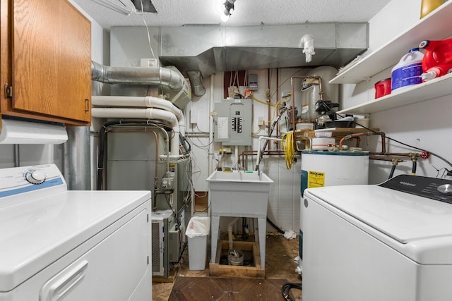 washroom with separate washer and dryer, electric panel, water heater, and cabinet space