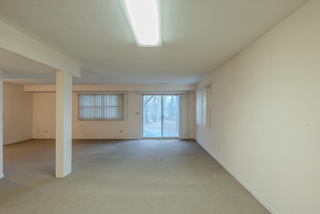 interior space featuring light carpet