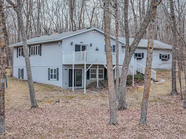 back of property with a deck