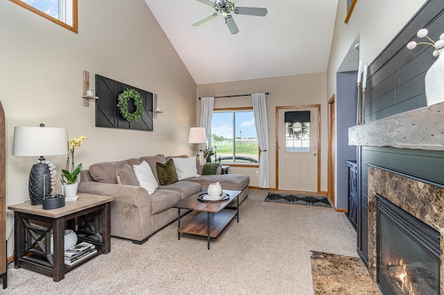 3831 232nd Ave NW Unit 105, Saint Francis, MN 55070 - living room with high vaulted ceiling, a premium fireplace, ceiling fan, and light carpet
