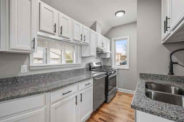 1527 Minnehaha Ave W, Saint Paul, MN 55104 - kitchen featuring appliances with stainless steel finishes, a healthy amount of sunlight, under cabinet range hood, and a sink