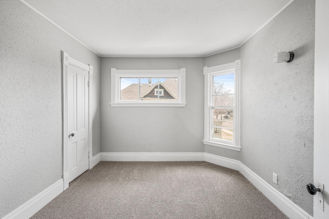 1527 Minnehaha Ave W, Saint Paul, MN 55104 - carpeted empty room featuring baseboards and a textured wall
