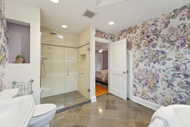 2736 Chowen Ave S, Minneapolis, MN 55416 - ensuite bathroom featuring baseboards, a stall shower, visible vents, and wallpapered walls