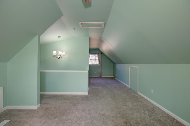 bonus room featuring baseboards, an inviting chandelier, carpet, and vaulted ceiling