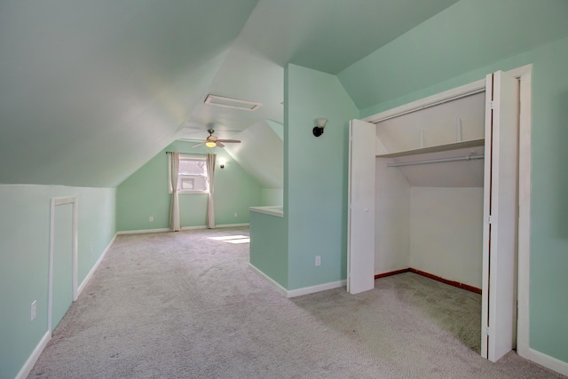 bonus room with baseboards, visible vents, carpet floors, and lofted ceiling
