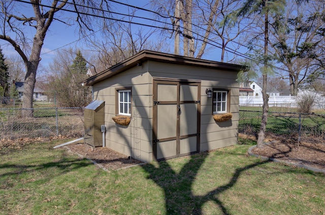 view of shed featuring fence private yard