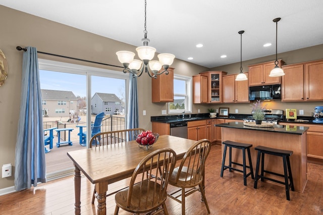 4584 Merganser Dr, Minnetrista, MN 55375 - dining space with a chandelier, wood finished floors, baseboards, and recessed lighting
