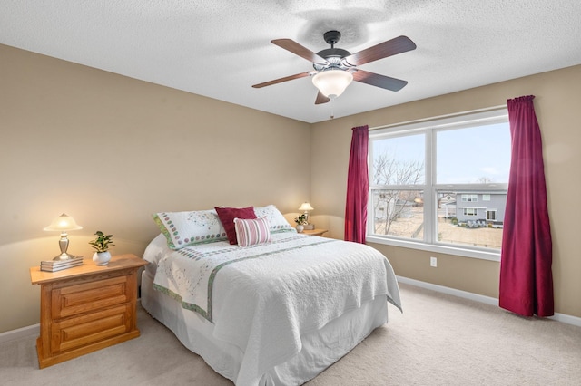 4584 Merganser Dr, Minnetrista, MN 55375 - bedroom featuring light colored carpet, baseboards, a ceiling fan, and a textured ceiling