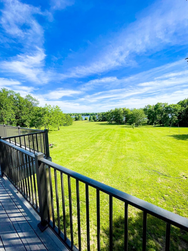 41634 Long Lake Rd, Ottertail, MN 56571 - wooden terrace featuring a yard and view of scattered trees