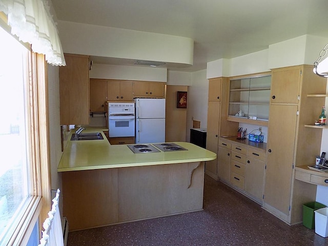 kitchen with light countertops, open shelves, a sink, white appliances, and a peninsula