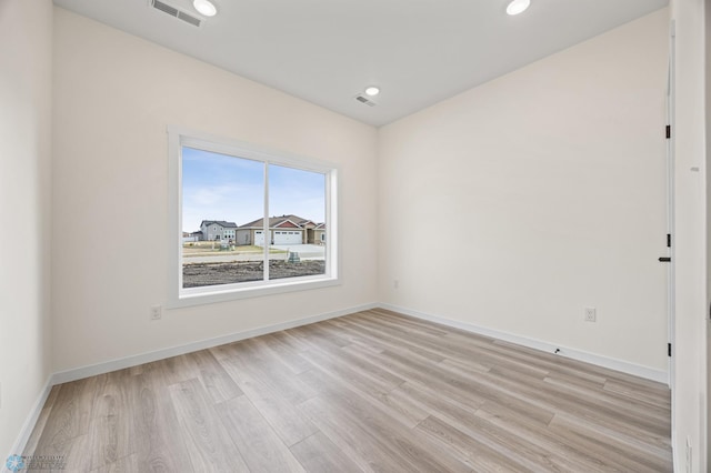 4242 Bristlecone Loop S, Fargo, ND 58104 - unfurnished room with light wood-type flooring and recessed lighting