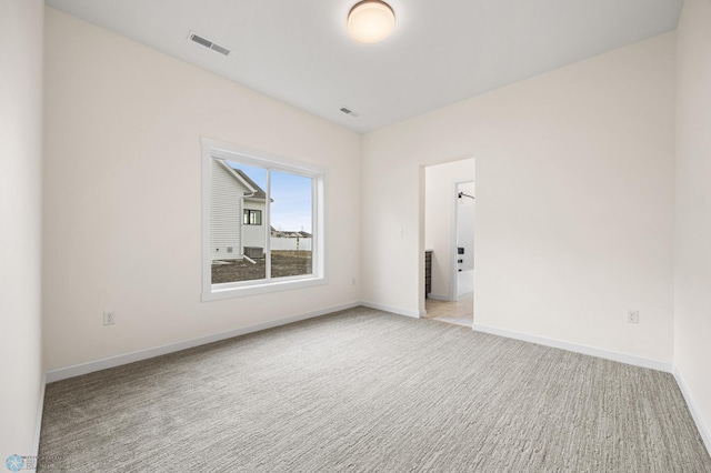 4242 Bristlecone Loop S, Fargo, ND 58104 - unfurnished room with light carpet