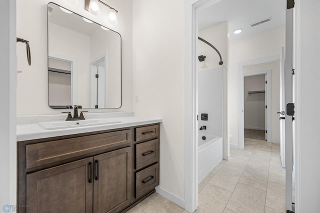 4242 Bristlecone Loop S, Fargo, ND 58104 - bathroom featuring vanity, tub / shower combination, and tile patterned flooring