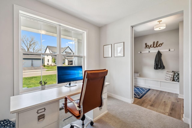 home office with carpet and baseboards