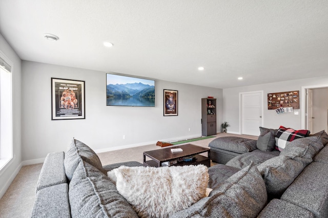 carpeted living room with baseboards and recessed lighting