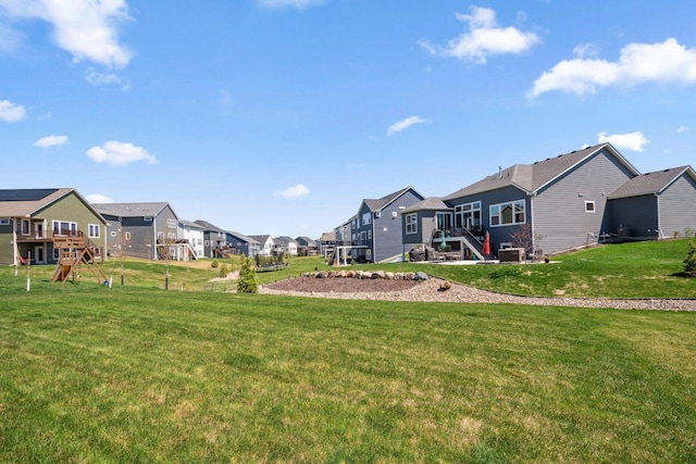 view of yard featuring a residential view