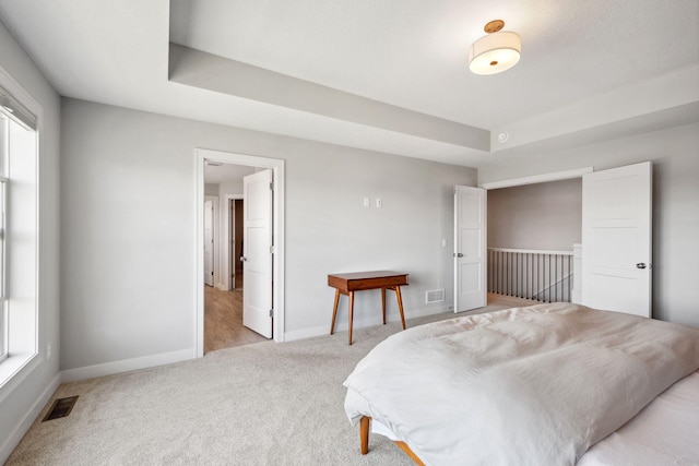 10683 40th St N, Lake Elmo, MN 55042 - bedroom featuring light carpet and baseboards