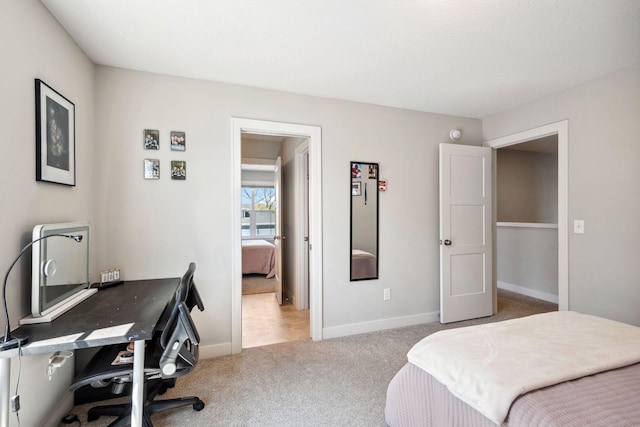 10683 40th St N, Lake Elmo, MN 55042 - carpeted bedroom with baseboards and an office area