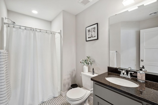 10683 40th St N, Lake Elmo, MN 55042 - bathroom with toilet, vanity, and curtained shower