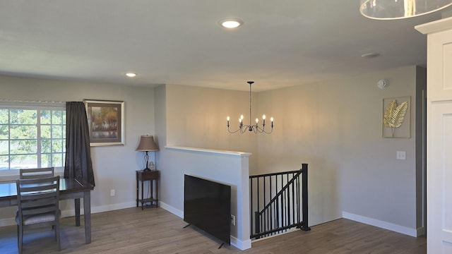 1138 Pleasant Ct SW, Bemidji Twp, MN 56601 - interior space featuring an inviting chandelier, baseboards, recessed lighting, and wood finished floors