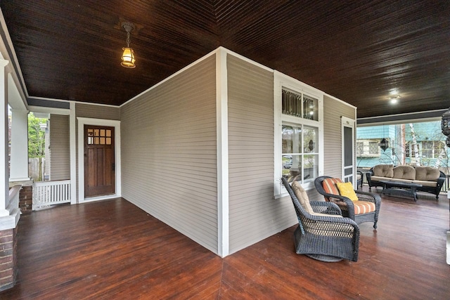 904 Lincoln Ave, Saint Paul, MN 55105 - porch featuring radiator heating unit and outdoor lounge area