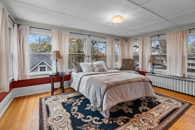 904 Lincoln Ave, Saint Paul, MN 55105 - bedroom with hardwood / wood-style flooring and radiator