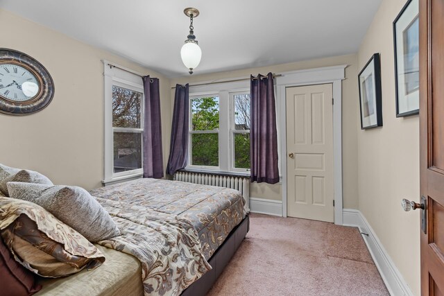 904 Lincoln Ave, Saint Paul, MN 55105 - carpeted bedroom featuring radiator and baseboards