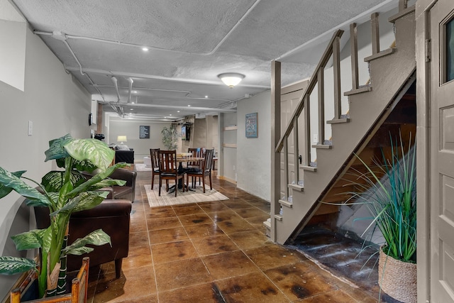 904 Lincoln Ave, Saint Paul, MN 55105 - dining space with stairs, a textured ceiling, and tile patterned flooring