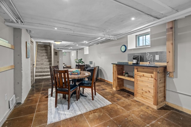 904 Lincoln Ave, Saint Paul, MN 55105 - dining area with stairs, recessed lighting, and dark tile patterned flooring