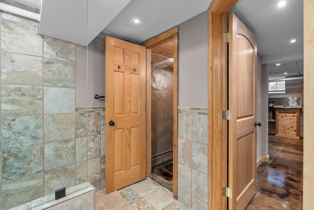 904 Lincoln Ave, Saint Paul, MN 55105 - bathroom with tile walls, recessed lighting, a wainscoted wall, and a closet