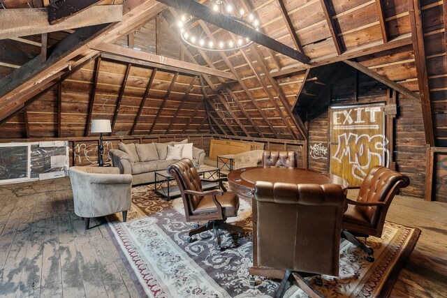 904 Lincoln Ave, Saint Paul, MN 55105 - living room with lofted ceiling, hardwood / wood-style flooring, a chandelier, and wood walls
