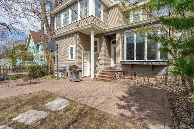 904 Lincoln Ave, Saint Paul, MN 55105 - rear view of house featuring a patio area