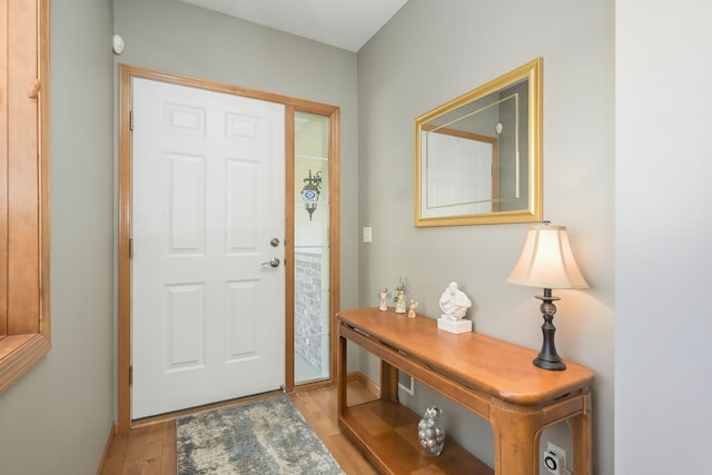 entrance foyer featuring light wood finished floors