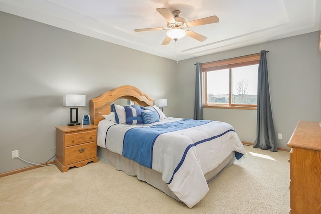 bedroom featuring carpet flooring, a ceiling fan, and baseboards