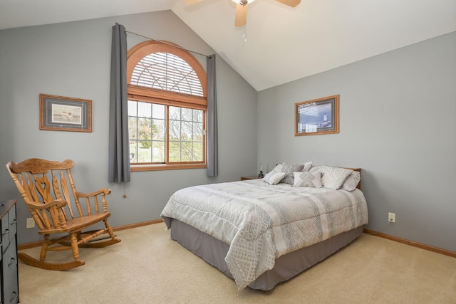 carpeted bedroom with baseboards, vaulted ceiling, and ceiling fan