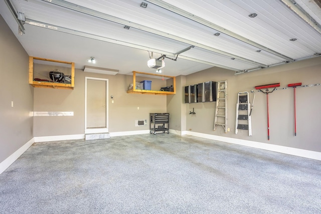 garage featuring baseboards and a garage door opener