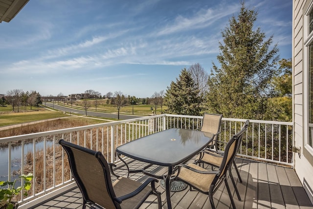 wooden deck with outdoor dining area